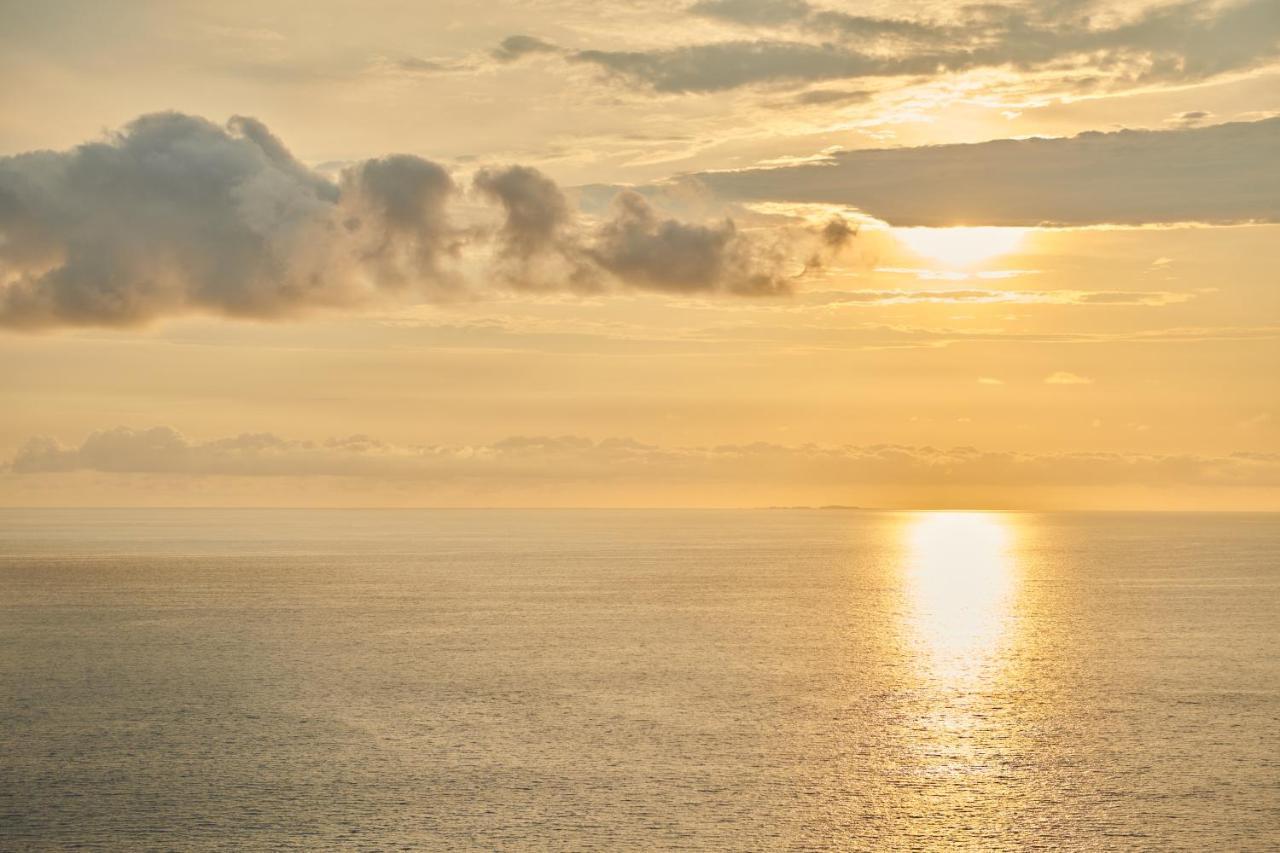 Hotel Luxury Patio Azul (Adults Only) Puerto Vallarta Dış mekan fotoğraf Sunset over the Atlantic Ocean